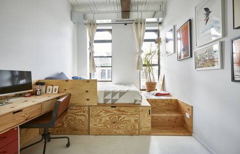 "The smaller room seconds as Sam’s office, with a plywood platform bed that has giant storage drawers underneath. I saw this design on Pinterest and we cobbled it together with our contractor and the cheapest possible wood we could find.” Credit: <a href="https://www.apartmenttherapy.com/authors/erin-derby">Erin Derby</a> Home Office With Bed, Jessica Bennett, Brooklyn Loft, Plywood Storage, Platform Bedroom, Platform Bed With Drawers, Plywood Interior, Bed Platform, Japanese Room