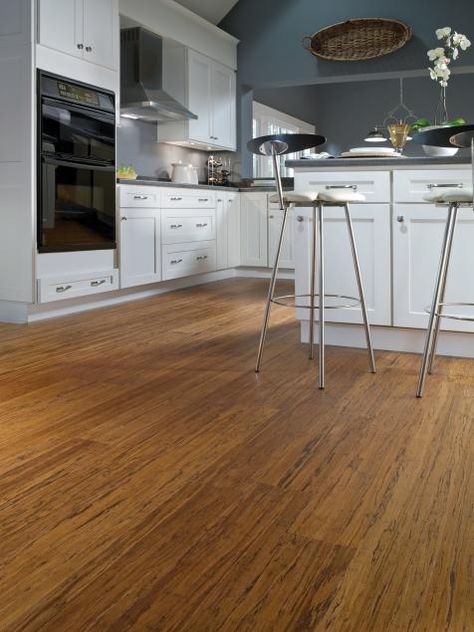 Pros and Cons of Bamboo Flooring | HGTV Engineered Bamboo Flooring, Best Flooring For Kitchen, Bamboo Floors, Sustainable Flooring, Kitchen Floor Tiles Ideas, Woodworking Projects Furniture, Floor Tile Design, Woodworking Furniture Plans, Woodworking Plans Diy