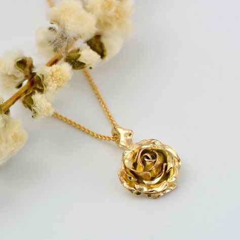 Flower Necklace, Gold Rose Necklace, Confirmation Gift A truly romantic gift! handcrafted solid gold rose necklace. The pendant features a beautiful rose suspended by delicate thorns. * Material: 9ct Fairtrade / recycle UK hallmarked gold * Size of Rose: Approx 1 cm (0.4in) diameter * Length of Chain: 1 mm Spiga chain 40 cm (16in) long (it could be longer on request ) * Ready to Ship in 10 business day * Made in the United Kingdom PACKAGING: Comes uniquely packaged in my Magnolia Restrepo Style Gold Rose Necklace, Flower Necklace Gold, Gold Jewelry Stores, Necklace Flower, Rose Pendant, Confirmation Gifts, Rose Necklace, Rose Jewelry, Necklace Rose