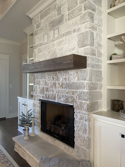 Stone Fireplace With Crown Molding, Stacked Stone Electric Fireplace, Stone Fireplace Floor To Ceiling With Built Ins, Interior Stone Fireplace, Stone Fireplaces Ideas, Gas Fireplace With Hearth, Stone Over Brick Fireplace, Fireplace With Ledge, Small Stone Fireplace