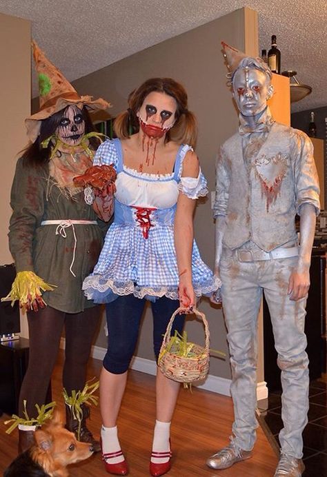 Wizard of Oz group Halloween costume. Dorthy, Scarecrow, Tinman. DIY. Makeup. Zombie Wizard Of Oz, Scary Wizard Of Oz Costumes, Wizard Of Oz Scarecrow Costume Women, Diy Scary Scarecrow Costume, Scary Scarecrow Costume Women, Tinman Costume Diy, Dorthy Costume Women, Diy Wizard Of Oz Costumes, Group Halloween Costumes Scary