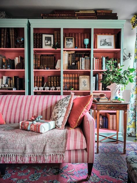 Bookshelves Behind Couch, Curated Bookshelf, Pink Library, Period Living, Brown Furniture, Decorating Shelves, Maximalism, A Living Room, Home Library