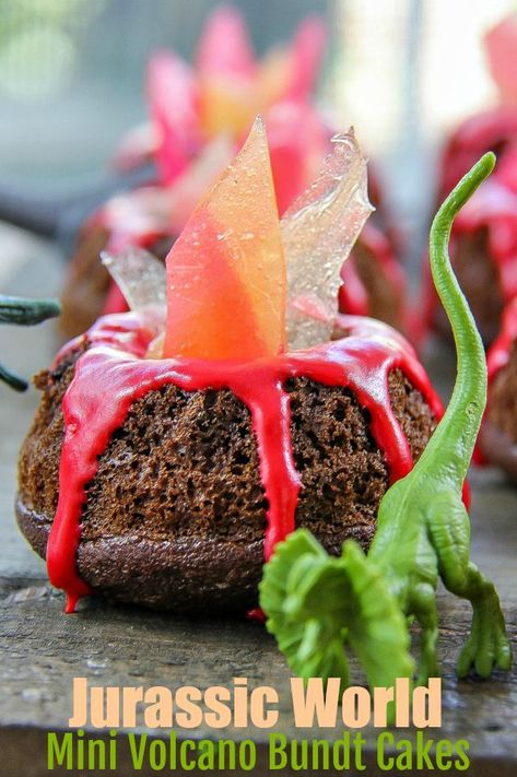 Jurassic World Mini Volcano Bundt Cakes Recipe #dinosaur #dessert #kids Mini Volcano Cakes, Volcano Bundt Cake, Snacks Party Ideas, Volcano Cupcakes, Volcano Party, Mini Volcano, Volcano Birthday, Dinosaur Snacks, Volcano Cake