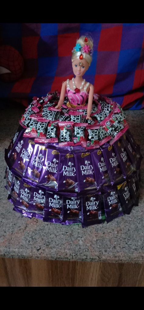 Barbie Doll Cake, Barbie Doll Cakes, Dairy Milk Chocolate, Doll Cake, Chocolate Decorations, Dairy Milk, Milk Chocolate, Barbie Doll, Chocolate Milk