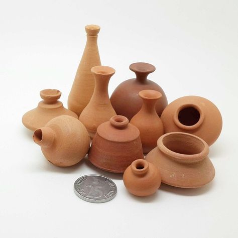 Yes, they are wheel thrown miniature pots in terracotta.   This is from back then (in 2005) when I had enrolled myself into Raheja Arts College (Worli, Mumbai) to become a trained and Certified Potter & Ceramist.  To my teacher’s bewilderment all I wanted to make was miniature pots, whole day.. whole year…. Needless to say,  I don’t know how to throw a regular size pot on the wheel!!  #SmallIdea #MiniatureArt #MiniaturePots #WheelPottery #Terracotta Miniature Pots, Miniature Pot, Miniature Terracotta Pots, Teracotta Pots, Thali Decoration Ideas, Fairy House Crafts, Miniature Pottery, Ceramic Framed, Traditional Pottery