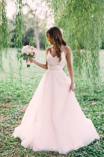 This sweet dress is from Lovely Bride DC: http://www.stylemepretty.com/2015/05/19/the-prettiest-blush-pink-wedding-dresses/ Peach Blush Wedding Dress, Till Dress, Peach Blush Wedding, Light Pink Wedding Dress, Blush Wedding Gown, Blush Pink Wedding Dress, Wedding Dresses Images, Light Pink Wedding, Blush Wedding Dress