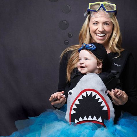 Be the talk of the deep seas with this frightfully cute shark costume. #Halloween Baby Wearing Costumes, Mom And Baby Costumes, Baby Carrier Costume, Scuba Diver Costume, Flamingo Halloween, Mom Halloween Costumes, Mom And Baby Dresses, Mom Costumes, Shark Costume