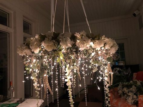 Greenery/floral Chandelier? | Weddings, Do It Yourself | Wedding Forums | WeddingWire Floral Chandelier With Lights, Flower Chandelier Diy, Chandelier Greenery, Floral Chandelier Diy, Decorate Chandelier, Floral Chandelier Wedding, Chandelier Wedding Decor, Registry Wedding Dress, Quince Decor