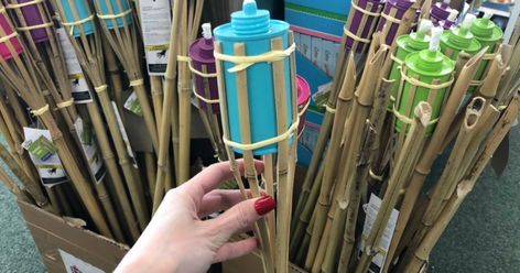 Colorful Bamboo Tiki Torches Just $1 at Dollar Tree - Hip2Save Tiki Torch Centerpiece Ideas, Diy Tiki Torches, Diy Tiki Torch Decoration, Tiki Torch Decoration Ideas, Tiki Torches Around Pool, Tiki Torch Ideas Backyards, Diy Tiki Torch Stand, Diy Tiki Decorations, Tiki Torch Stand