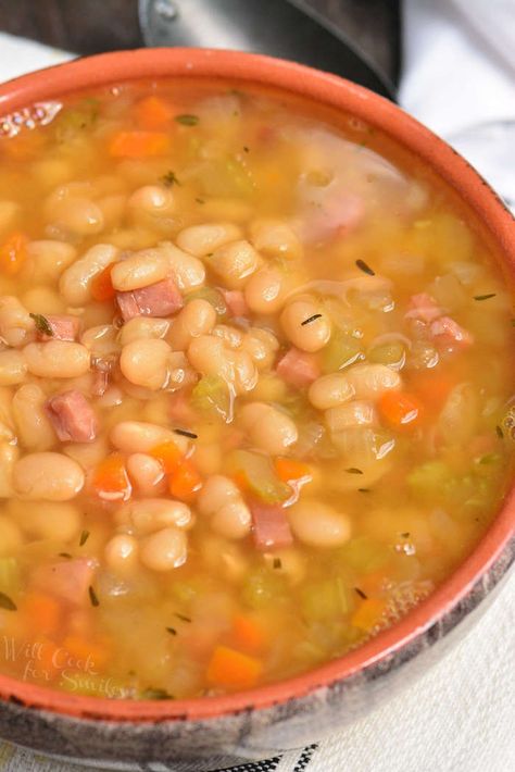 Ham and Bean Soup made in an Instant Pot. This soup is made with leftover ham, navy beans, and a simple combination of veggies and spices. Ham Hocks And Beans, Instant Pot Ham, Ham And Bean, Bean And Bacon Soup, 15 Bean Soup, Navy Beans, Soup Beans, Bacon Soup, Ham Soup