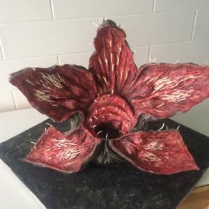 Stranger Things Demogorgon Cake Demogorgon Cake, White Chocolate Filling, Stranger Things Halloween Party, Stranger Things Demogorgon, Raspberry And White Chocolate, Stranger Things Halloween, Chocolate Mud Cake, Boy Cake, Mud Cake