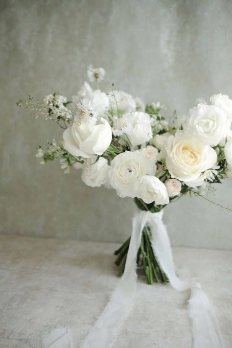 Rustic White Bridal Bouquet, White Rose And Magnolia Bouquet, Monochromatic Bridal Bouquet, Loose White Bouquet, White And Green Ceremony Flowers, White Ranunculus Wedding Bouquet, Dainty Wedding Bouquet, Ranculus Flowers Bouquet, Whimsical Bridesmaid Bouquet