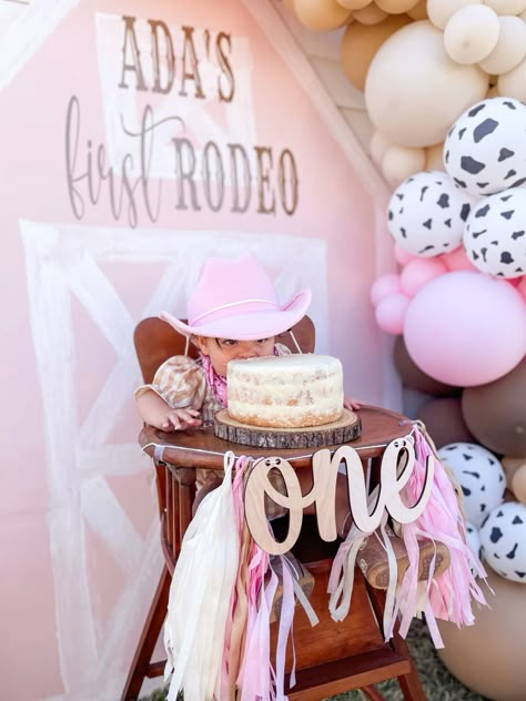 First rodeo birthday party, girls first birthday, rodeo party, cowgirl party, smash cake Rodeo Theme First Birthday Party, Cowgirl Theme 1st Birthday, First Rodeo Birthday Party Girl Decor, 1st Rodeo Birthday Party Ideas, Wild West First Birthday Girl, Daughters First Birthday Theme, Cowgirl Themed 1st Birthday Party, Cowgirl Smash Cake First Birthdays, Baby Girl 1st Rodeo Birthday