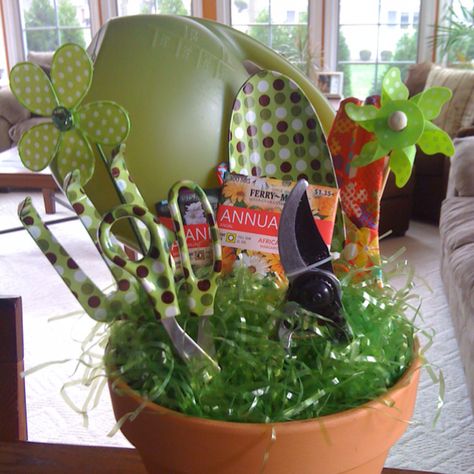 Garden tools gift basket for auction. From lime green watering can to polka dot shears, it's down in the dirt adorable. Landscaping Gift Basket, Gardening Basket Ideas Silent Auction, Plant Gift Basket Fundraising, Watering Can Gift Basket, Gardening Gift Basket, Gardening Auction Basket, Gardening Gift Baskets, Auction Basket, Retirement Party Gifts