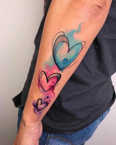 Watercolor Heart Tattoos 3 Watercolor Heart Tattoos, Heart Tattoo Ideas, Watercolor Butterfly Tattoo, Small Watercolor Tattoo, Colour Tattoo For Women, Watercolor Rose Tattoos, Colorful Tattoo, Heart Watercolor, Mommy Tattoos