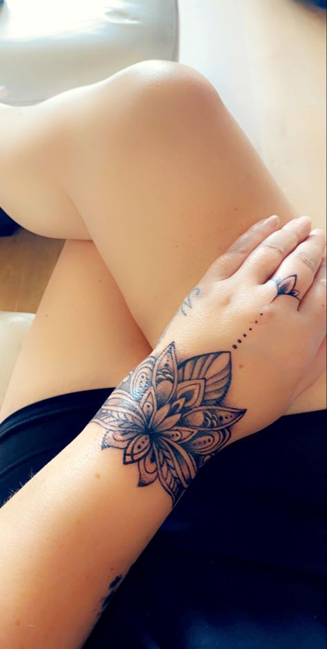 Butterfly Cuff Tattoo, Lotus Tattoo On Wrist, Lotus Flower Hand Tattoos For Women, Feather Wrist Tattoos For Women, Hand Cuff Tattoo, Lotus Flower Tattoo Hand, Lotus Flower Hand Tattoo, Lotus Hand Tattoo, Ankh Tattoos