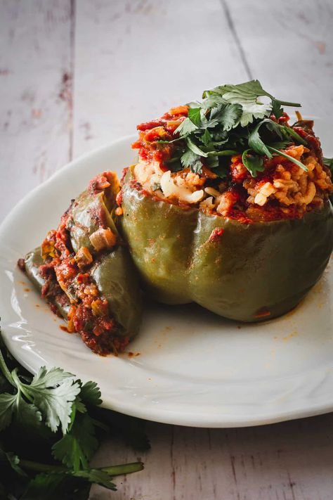 Moroccan Ground Turkey Stuffed Peppers With Rice, Cilantro And Baharat Moroccan Stuffed Peppers, Spicy Red Sauce, Turkey Stuffed Peppers, Ground Turkey Stuffed Peppers, Stuffed Peppers With Rice, Vegetarian Stuffed Peppers, Stuffed Peppers Turkey, Bell Pepper Recipes, Sweet Peppers