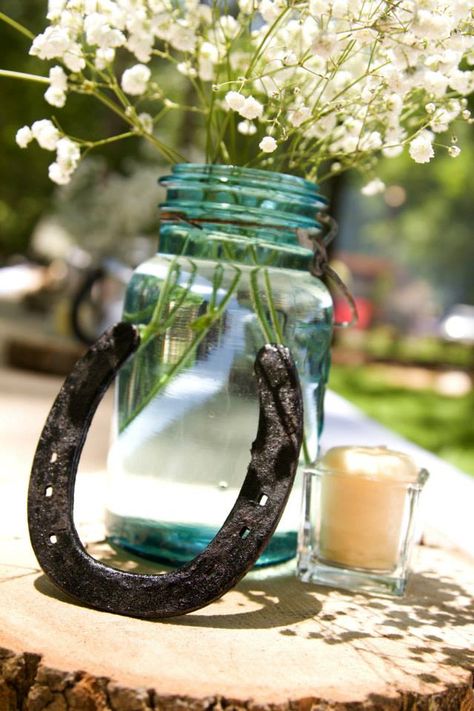 Blue Mason Jar Baby's Breath Horse Shoe Clear Votive Wood Plate Centerpiece  Rustic Wedding pinterest.com/ssjones1207   Photographer Krystle Myers pinterest.com/kryddlez/ Cowboy Wedding Decorations, Western Theme Party, Fiesta Tropical, Cowboy Wedding, Wedding Country, Blue Mason Jars, Western Parties, Rustic Centerpieces, Rustic Wedding Centerpieces