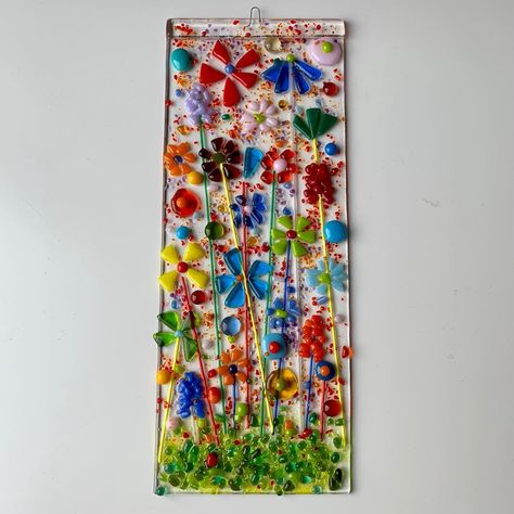 Cornelia Haller on Instagram: “Sold today in my etsy shop: fused glass wallhanging #with colorful flowers 🌺🌸🌼 #glassfusing #fusedglass #glasfusing#loveglass…” 2d Flowers, Blob Painting, Bunting Ideas, Fused Glass Dishes, Fused Glass Wall Art, Glass Fusion Ideas, Fused Glass Artwork, Wine Bottle Candles, Glass Fusing Projects