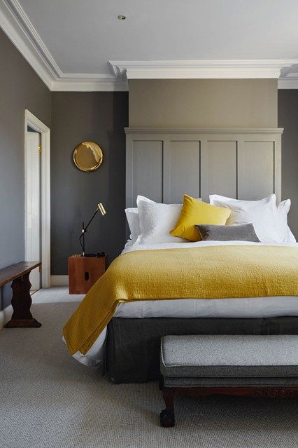 Discover bedroom ideas on HOUSE - design, food and travel by House & Garden. Mustard textiles complement grey walls in this London house. Mustard Bedroom, 카페 인테리어 디자인, Yellow Bedroom, Bilik Tidur, Hobby Room, Trendy Bedroom, Gray Bedroom, Spare Bedroom, Stylish Bedroom