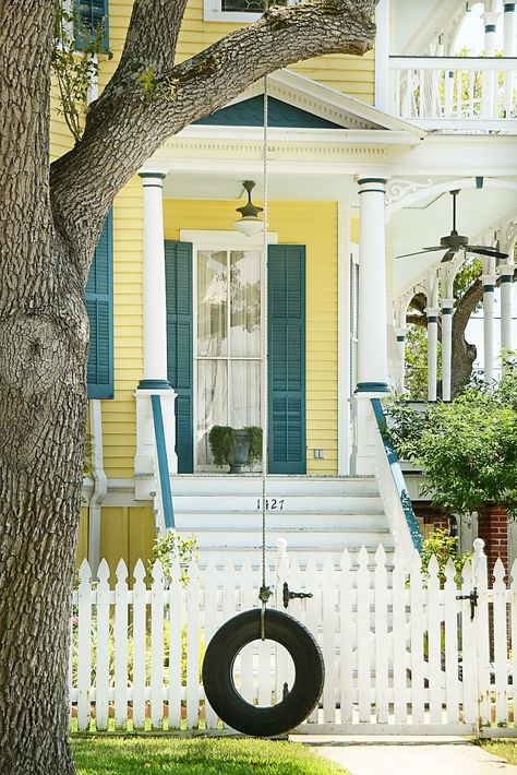 quintessential yellow country house with a white picket fence and accents. lets not forget the tree swing! Yellow House Exterior, Ideas Terraza, Colors For House, Paint Colors For House, Window Shutters Exterior, Shutter Colors, Best Exterior Paint, House Paint Color Combination, House Shutters