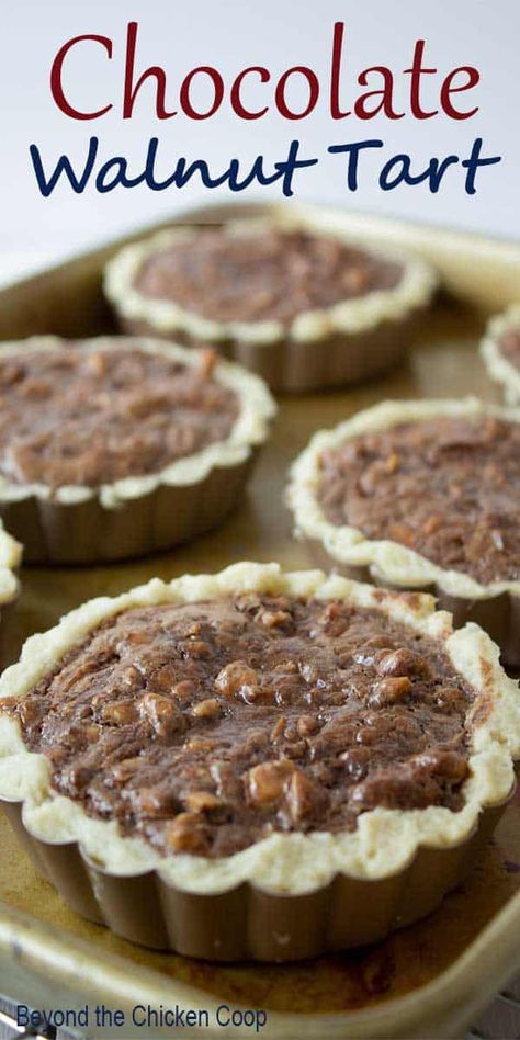 Mini Chocolate Walnut tart made with toasted walnuts and a chocolate filling. This delicious dessert is perfect for any dinner party. #chocolatetart #walnuttart Walnut Tart, Mini Tart Recipes, Tart Dessert, Mini Tart, Sweet Pie, Toasted Walnuts, Chocolate Filling, Chocolate Tart, Köstliche Desserts