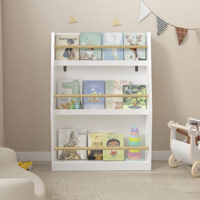 Features:Encourage Reading & Organization - Use this kids book rack to set up a reading corner for your toddler. Or, let your child learn how to keep their bedroom neat without books/toys organizer shelves. Your kids can see and pick up his favorite board books from the kid's bookshelves easily instead of stacking them on traditional bookcasesPerfect for book storage in your toddler’s bedroom, playroom, nursery, or living room. Ideal for children aged 3 and up. Spefications:Dimensions:Assembly:W Nursery Bookshelf Ideas, Nursery Book Storage, Nursery Bookshelves, Traditional Bookcases, Toys Organizer, Toddler Boy Room Decor, Nursery Book, Child Bedroom, Book Corner