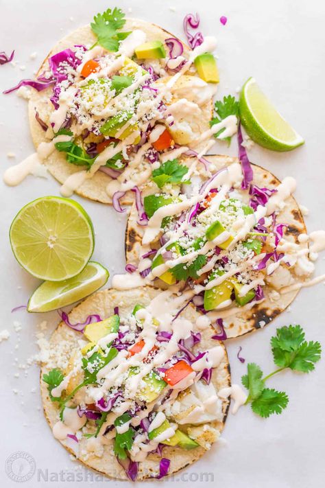 Fish Tacos Recipe with Best Fish Taco Sauce! - NatashasKitchen.com Best Fish Taco Sauce, Fish Taco Toppings, Slaw For Fish Tacos, Natashas Kitchen, Fish Tacos With Cabbage, Fish Taco Sauce, Stuffed Vegetables, Taco Ingredients, Fish Taco