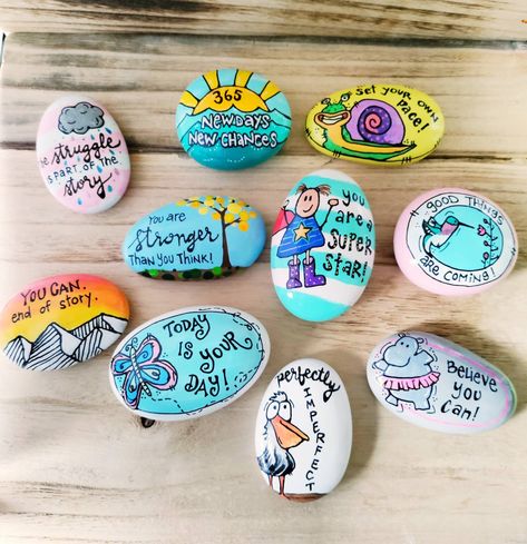 "Artsy, folksy, happy hand-painted rocks. Perfect to give to your family, friends, neighbors, clients or students...anyone who could use some encouragement and a reminder that you care.  All rocks are handmade from eco-friendly cement for smoothness and durability, and are hand-painted with acrylics by me. Sealed with high quality resin for maximum shine and to keep them safe from the elements--they last beautifully whether kept outside or in a sunny windowsill.  These rocks are all between 2-3 inches long by 1.5-2 inches across. Because they are individually hand-painted, they may differ slightly from the picture.  Please specify in the \"Number of Items\" Box how many items you would like to purchase.  You may order up to ten items. EASELS COUNT AS ONE ITEM. For example, if you want 3 ro