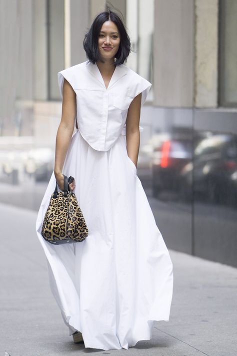 Get Your Street Style Fix Straight From New York Fashion Week Day 5 White Shirt With Dress Over It, Shirt Dress Street Style, White Street Style, Tiffany Hsu, Khan Market, Edgy Bridal, Round Dress, Shirt Dress White, New York Fashion Week Street Style