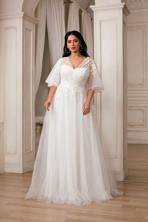 Yerdina Wedding Dress | Peony Love Collection 2022 | Brilanta by Anna Sposa Group. Breathtaking off shoulders wedding dress. Seductive deep v-neck. Butterfly Sleeve Wedding Dress Plus Size, Plus Size Flutter Sleeve Wedding Dress, Empire Waist Wedding Dress Plus Size, Plus Size Wedding Dresses Modest, Plus Size Whimsical Wedding Dress, Aline Wedding Dress Plus Size, Plus Size Wedding Gowns With Sleeves, Wedding Dresses For Busty Women, Plus Size Wedding Dresses Summer