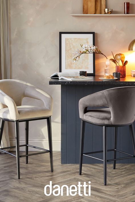 Relax with Coffee or Cocktails in ultimate comfort and style with the Heath Velvet Bar Stool. This sleek, modern armchair style bar stool is designed with generous seating and scooped arms for maximum comfort and support. With its high back detailing and key-hole sides for style, the Heath is the perfect choice for an elegant yet comfortable experience at your breakfast bar or kitchen island. Designed in the UK and exclusive to Danetti. Kitchen Island Stools With Backs, Modern Bar Stools Kitchen, Modern Kitchen Bar, Breakfast Chairs, Breakfast Bar Chairs, Island Chairs, Bar Stools Kitchen Island, Kursi Bar, Breakfast Bar Stools