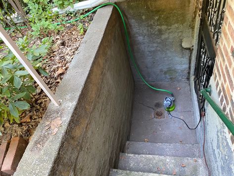 Everything I Did to Flood-Proof My Old House | Reviews by Wirecutter Flood Proof House, Hydrangea House, Basement Entrance, Sewer System, House Foundation, Trial And Error, Rain Barrel, Rain Water Collection, Rain Garden