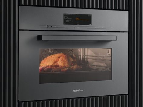 Miele-Combi-Steam-Oven-1 - Good Design Oven Turkey Recipes, Combi Oven, Steam Oven, Domestic Appliances, Empanadas Recipe, Stainless Steel Cleaning, Built In Ovens, Turkey Recipes, A Table