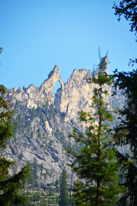 Bitterroot Valley of Montana Iconic Blodgett Arch, which is all granite and formed from glaciers receding over 1000 years ago.  An amazing 3 mile hike into the wilderness from Hamilton, Montana Bitterroot Mountains, Hamilton Montana, Montana Hiking, Howling Coyote, Western Montana, Montana Vacation, Montana Mountains, Montana Travel, Montana Homes