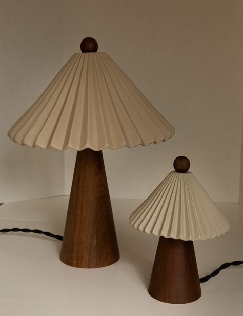 The small and mini Prarie Ceramic Table Lamps by Huey with walnut bodies and pleated ceramic shades sit next to each other. Huey Lightshop, Floor Desk, Wooden Lamps, Luminaire Vintage, Bedside Lamps, Outdoor Dining Furniture, Luminaire Design, Ceramic Table Lamps, Beautiful Furniture