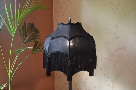 Gothic lampshade scallop with rayon fringe and tassels at bottom. Gothic style hand-stitched lampshade... Perfectly fit for a Halloween Style theme ... Plain yet elegant piece of Art; purely hand sewn. Specifically design for Gothic & Halloween colour scheme & surroundings.  Add a touch of Victorian elegance to your home decor with this beautiful black lampshade from BespokeByNikita. The scalloped pattern and pleated design give it a unique and artistic look. Measuring 20 CM in height and 33 CM Gothic Lampshade, Victorian Elegance, Victorian Lampshades, Black Lampshade, Salon Suites, House Aesthetic, Halloween Style, Gothic Halloween, Halloween Fashion