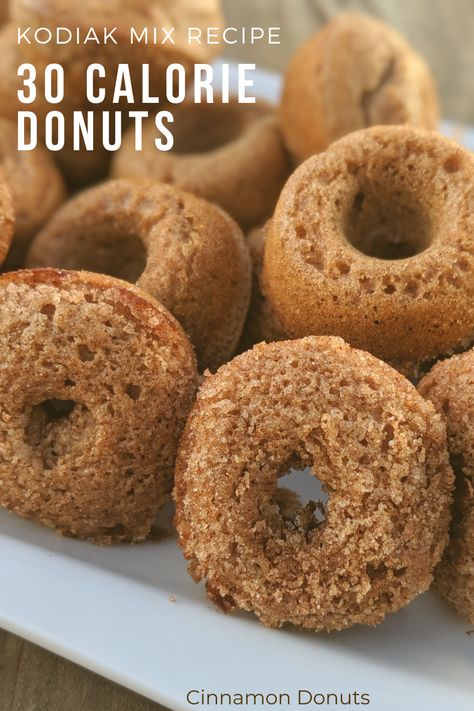 Healthy cinnamon donuts recipe. Made with kodiak mix. high in protein, low in fat, low in calories, and low in sugar. #healthytreats  #healthydonuts  #healthyrecipe Protein Donuts Kodiak Cakes, Protein Donut Recipe Kodiak, Kodiak Cinnamon Oat Recipes, Kodiak Donuts Recipe, Healthy Baked Donut Recipes, Healthy Donut Recipes, Healthy Donut Recipe, Protein Donut Recipe, Kodiak Muffins