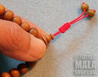 Step 1 - Adjusting Wrist Mala Beads with Tibetan Knot Tibetan Knot, Buddhist Beads, Tibetan Mala, Diy Jewelry Making Tutorials, Knotted Mala, Wrist Mala, Beads Mala, Mala Bracelet, Sliding Knot