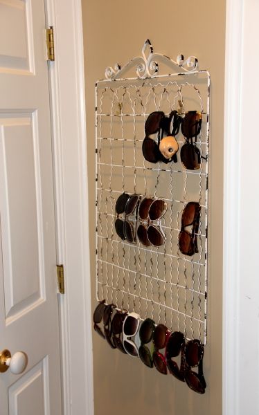 perfect way to organize our massive sunglasses collection.  Can you guess which ones are my husbands? #storage Bedroom Extension, Jewellery Organization, Sunglasses Storage Diy, Sunglass Storage, Boho Cozy, Sunglasses Organizer, Sunglasses Display, Sunglasses Storage, Optical Store