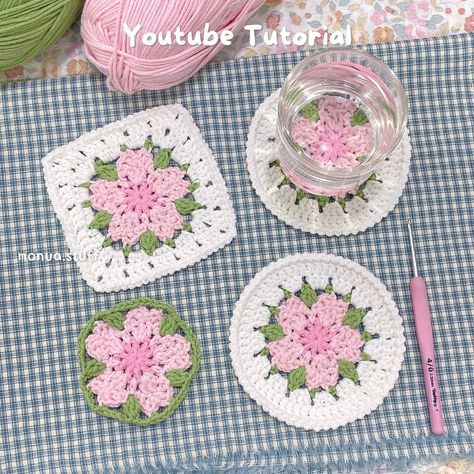 Cherry Blossom Coasters/Granny Square 🌸 I made some lovely coasters for this week’s video (๑･̑◡･̑๑) hope you enjoy it!! Tutorial is… | Instagram Flower Squares Crochet, Sakura Coaster Crochet, Granny Square Crochet Coaster, Crochet Cherry Blossom Granny Square, Sakura Crochet Pattern Free, Cherry Blossom Granny Square, Cherry Granny Square Pattern, Sakura Granny Square, Flower Coasters Crochet