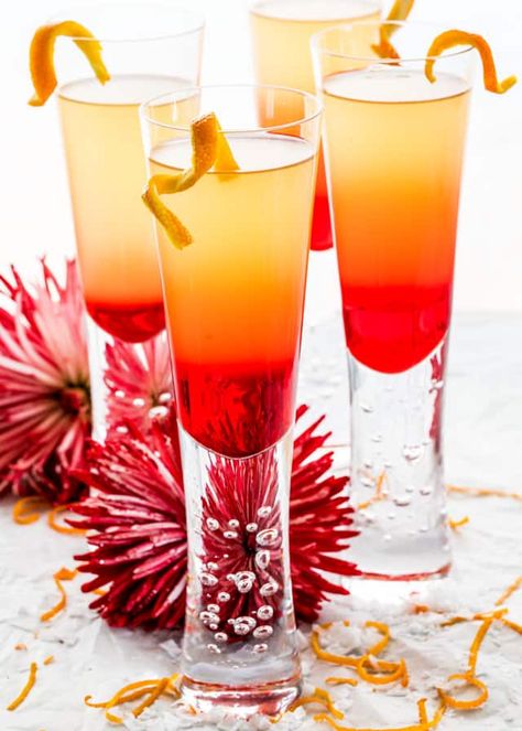 This Grenadine Sunrise is a gorgeous and festive cocktail perfect for any occasion! Easy to make, sweet and delicious, made with Prosecco, Grand Marnier, brandy and Grenadine. www.jocooks.com #grenadinesunrise Grand Marnier Cocktail, Grenadine Recipe, Grenadine Cocktail, Spicy Candy, Blackberry Wine, Jo Cooks, Indian Tea, Festive Cocktails, Vodka Drinks