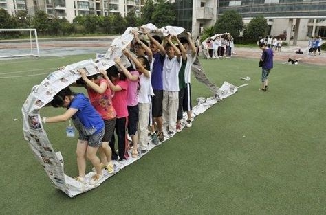 Kids inside the newspaper caterpillar wheel! Teamwork Skills, Team Building Games, Youth Games, Youth Group Games, Cooperative Games, Youth Activities, Building Games, Team Games, Team Training