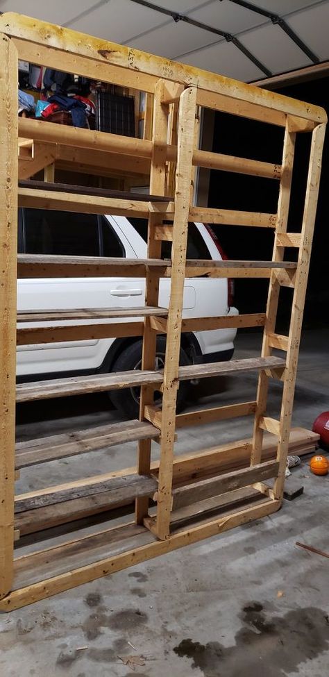 Up cycle a discarded box spring into a storage shelf with little or no money using reclaimed materials.    Increase your storage space in the garage, pantry, or craft room using a discarded box spring.    A tenant bought a new mattress set and needed to dispose of the old set. Not able to haul it off, she decided to breakdown all the parts to put in the dumpster. I hadn't notice her doing it until I saw the box spring frame laying out by the dumpster already stripped of material and t… Garage Pantry, Box Spring Frame, Wooden Ironing Board, Pallet Bookshelf, Box Spring Bed Frame, Spring Frame, Up Cycle, Crate Shelves, Box Spring Bed