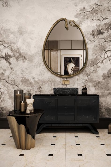 This luxury bathroom design exudes sophisticated contemporary elegance, featuring the Metropolitan Vanity Cabinet as the centerpiece. The cabinet's sleek, dark finish complements the monochromatic color scheme, creating a striking contrast against the artistic, nature-inspired mural. Nature Inspired Painting, Luxury Bathroom Design, Shaped Mirror, Stunning Interior Design, Monochromatic Color Scheme, Bathroom Design Inspiration, Gorgeous Bathroom, Bathroom Trends, Bathroom Design Luxury