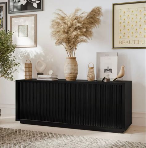 Love this affordable fluted tv stand. You won’t believe the price and 4.6 stars. Run on this deal. It won’t last Fluted tv stand / fluted cabinet/ modern furniture / black cabinet / walmart finds / target / drew Barrymore / toy storage Entertainment center / storage cabinet Follow my shop @blessedhouseofthree on the @shop.LTK app to shop this post and get my exclusive app-only content! #liketkit #LTKhome #LTKstyletip @shop.ltk https://liketk.it/4lQ05 Fluted Tv Stand, Living Room Design Black, Fluted Cabinet, Entertainment Center Storage, Tv Stand Decor Living Room, Stand For Tv, Storage Entertainment Center, Bedroom Tv Stand, Black And White Living Room