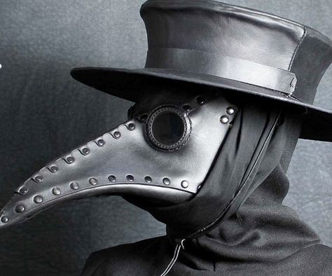 Transform yourself into an eerie-looking seventeenth century physician by wearing this plague doctor mask. Made with an adjustable strap so you can customize the fit, this leather mask features darkened goggles and an ominous elongated beak. Plague Mask, Plague Doctor Mask, Doctor Mask, Plague Doctor, Mask, Black