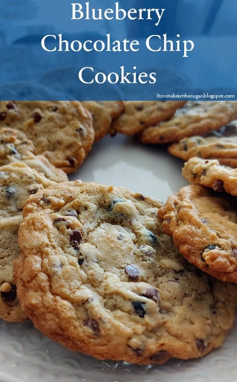 This is a great twist on classic chocolate chip cookies! Made with dried blueberries, cinnamon, and nutmeg, these are great when you want a cookie that is a little different. Blueberry Chocolate Chip Cookies, Dried Blueberry Cookies, Classic Chocolate Chip Cookies, Blueberry Chocolate, Blueberry Cookies, Dried Blueberries, Dough Balls, Mini Chocolate Chips, Cookie Sheet