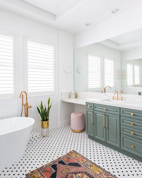 This bright bathroom brings in outdoor shine to highlight a gorgeous tile floor –all thanks to well-designed shutters. Thank you Kelly E. Stone for sharing! #louvershop #madeintheUSA #windows #windowtreatments #design #designinspo #interiordesign #decorinspo #renovation #interiorinspo #dreamhome #decor #homedecor #housegoals #interiorinspiration #instadesign #homeinspo #homeideas #howyouhome #shutters #blinds #plantationshutters #traditionalshutters #bathroomdesign #bathroomdecor White Mosaic Bathroom, Tile Floor Bathroom, Black And White Bathroom Floor, Green Bathroom Vanity, Black And White Tiles Bathroom, Laundry Room Tile, Interior Window Shutters, Green Vanity, White Bathroom Tiles