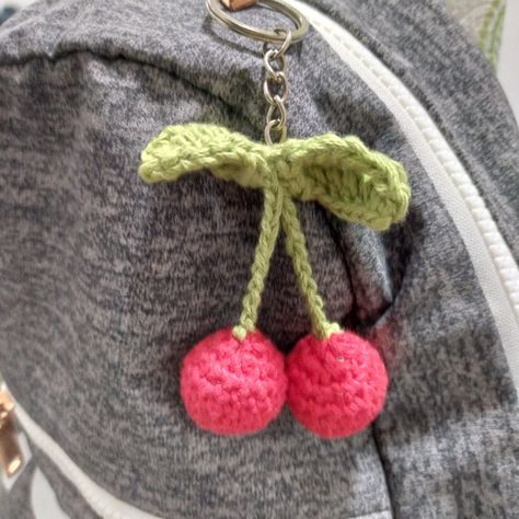 Small Crochet Accessories, Cute Crochet Keychain Ideas, Crochet Keychain Aesthetic, Crochet Rose Keychain, Keychain Crochet Ideas, Crochet Cherry Keychain, Crochet Cherries, Knitted Keychain, Crochet Keychain Ideas